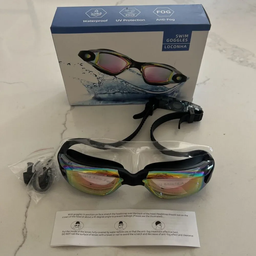 Laconha Swim Goggles Adjustable Anti Leak Anti Fog UV lens Unisex New In Box